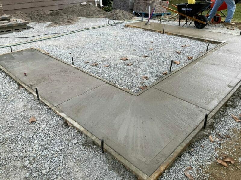 a-man-is-working-on-a-concrete-slab